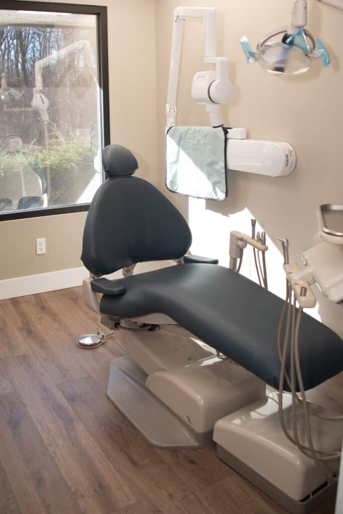 Dentist office with comfortable chair and a window